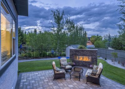 Fire Place At Night | Oasis Landscaping